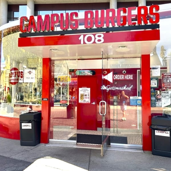 The red and white storefront of Campus Burgers, with an "OPEN" sign and "ORDER HERE" visible.